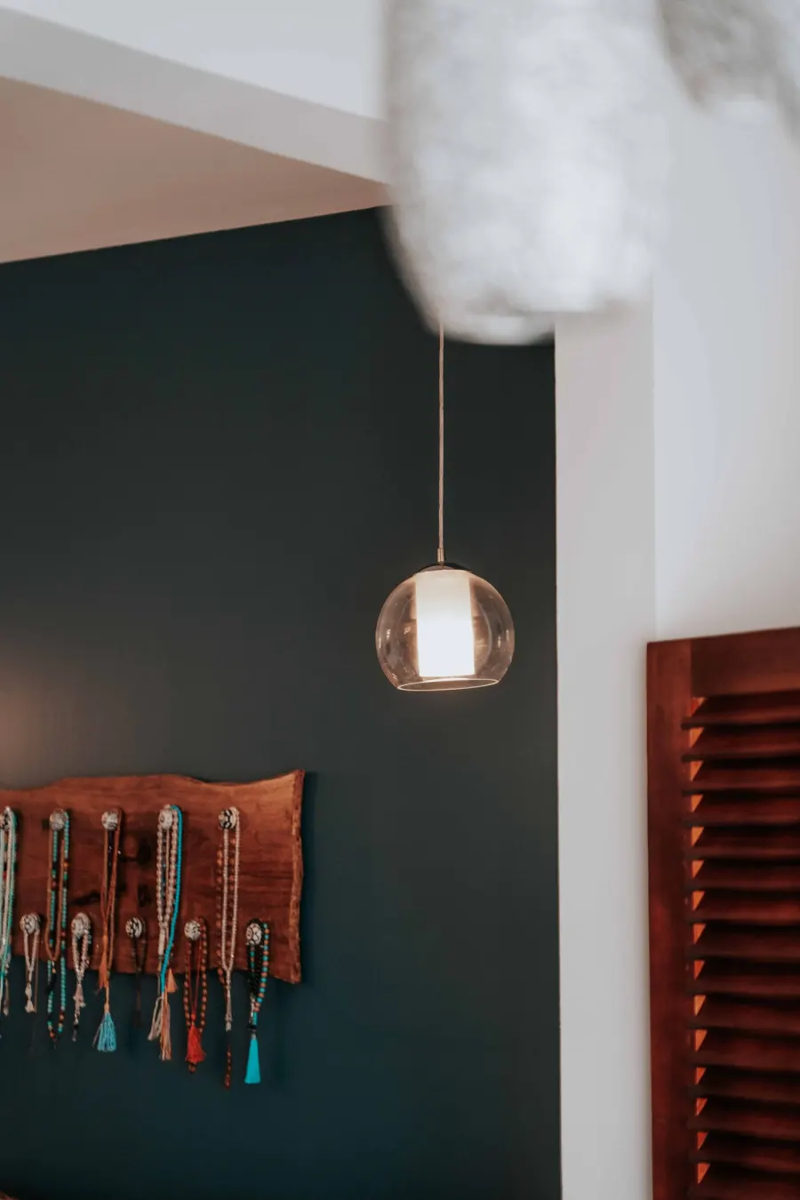 Warm pendant light in a finished room